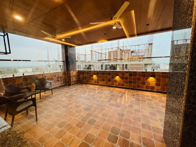 Open covered terrace at Swastik Boys Hostel